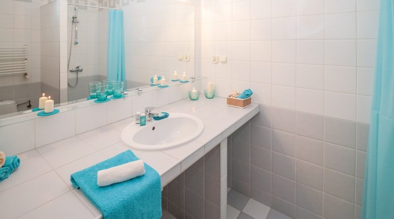 LED illuminated mirrors, bathroom, towels, lights.