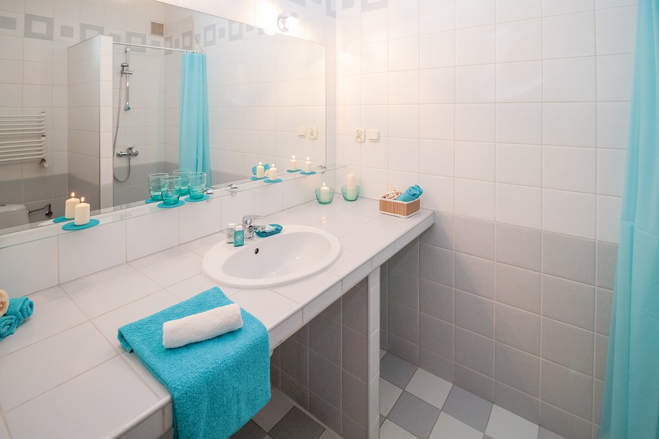 LED illuminated mirrors, bathroom, towels, lights.